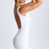 Vestido corto Valetta con espalda abierta y drapeado en blanco