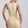 Vestido corto Zivanka de jersey elástico con aberturas y ribete de volantes en color crema