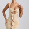 Vestido corto Zivanka de jersey elástico con aberturas y ribete de volantes en color crema