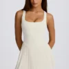 Vestido de tenis plisado con espalda abierta Soft Active en marfil