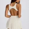 Vestido de tenis plisado con espalda abierta Soft Active en marfil