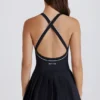 Vestido de tenis plisado con espalda cruzada Soft Active en negro