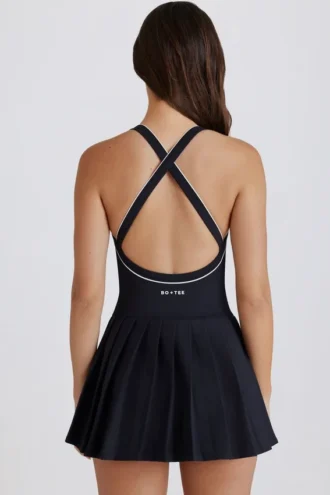 Vestido de tenis plisado con espalda cruzada Soft Active en negro