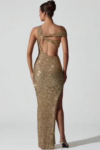 Vestido largo asimétrico con aberturas y adornos Persephone en dorado