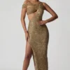 Vestido largo asimétrico con aberturas y adornos Persephone en dorado