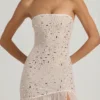 Vestido largo asimétrico semitransparente con adornos Kerra en blanco