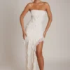 Vestido largo bandeau con volantes de Nevali en color marfil
