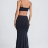 Vestido largo con aberturas y detalles metálicos Julitta en negro