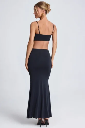 Vestido largo con aberturas y detalles metálicos Julitta en negro