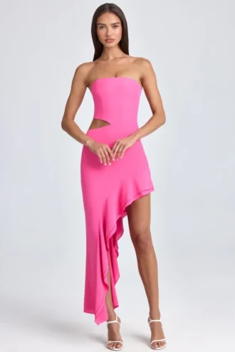 Vestido largo con corte bandeau, aberturas y volantes de Acelynn en rosa piruleta