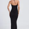 Vestido largo con cuello halter y aberturas con detalles metálicos Margot en negro