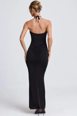 Vestido largo con cuello halter y aberturas con detalles metálicos Margot en negro