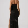 Vestido largo con cuello halter y adornos Sansel en negro