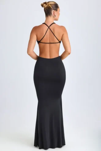 Vestido largo con cuello halter y detalles de herrajes Omarosa en negro