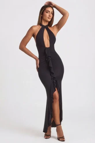 Vestido largo con cuello halter y volantes de Apolline en negro