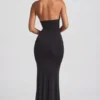 Vestido largo con cuello halter y volantes de Apolline en negro