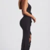 Vestido largo con cuello halter y volantes de Apolline en negro