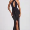 Vestido largo con cuello halter y volantes de Apolline en negro