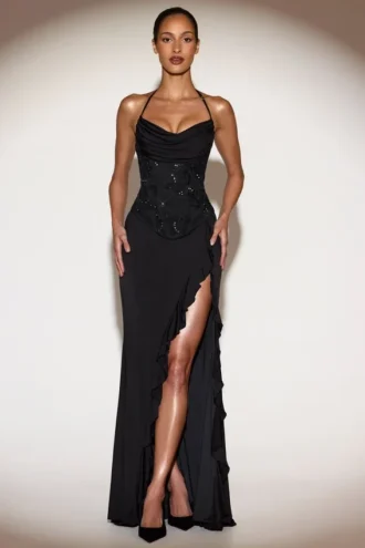 Vestido largo con cuello vuelto y volantes adornado Miravie en negro