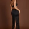 Vestido largo con escote pronunciado y flecos Solferina en negro