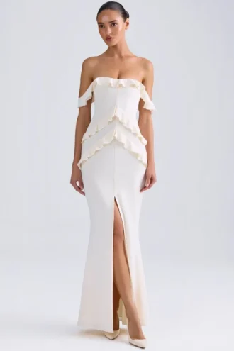 Vestido largo con volantes y hombros descubiertos Hemera en marfil