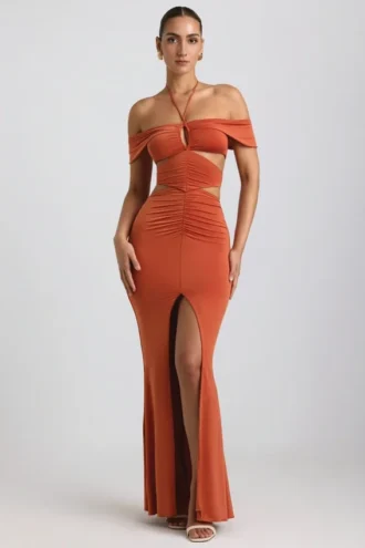 Vestido largo de jersey elástico con escote halter y aberturas de Karleen en naranja quemado