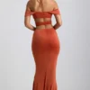 Vestido largo de jersey elástico con escote halter y aberturas de Karleen en naranja quemado