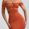 Vestido largo de jersey elástico con escote halter y aberturas de Karleen en naranja quemado