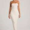Vestido largo Palermo con cuello vuelto y tirantes finos adornado en blanco