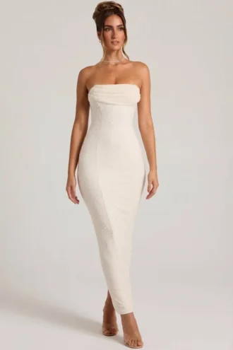 Vestido largo Palermo con cuello vuelto y tirantes finos adornado en blanco