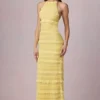 Vestido largo sin espalda con cuello halter y volantes Tove en amarillo limón