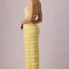 Vestido largo sin espalda con cuello halter y volantes Tove en amarillo limón