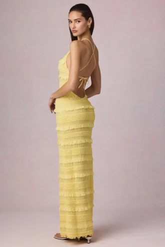 Vestido largo sin espalda con cuello halter y volantes Tove en amarillo limón