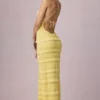 Vestido largo sin espalda con cuello halter y volantes Tove en amarillo limón