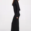Vestido largo sin espalda de jersey transparente con mangas largas Frances en negro