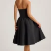 Vestido midi Angelina con cuello halter y lazo en negro