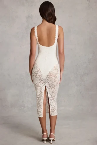 Vestido midi-axo Caia de encaje transparente con escote pronunciado y flecos en blanco