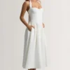 Vestido midi halter con detalle de botones Orlena en blanco