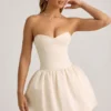 Vestido midi-longo convertible con detalle de lazo y bajo abullonado Gloriana en color marfil