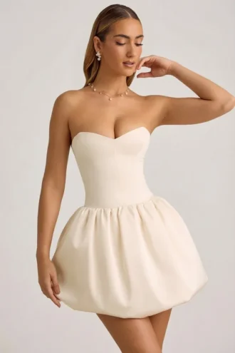 Vestido midi-longo convertible con detalle de lazo y bajo abullonado Gloriana en color marfil