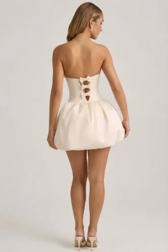 Vestido midi-longo convertible con detalle de lazo y bajo abullonado Gloriana en color marfil