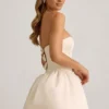 Vestido midi-longo convertible con detalle de lazo y bajo abullonado Gloriana en color marfil