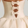 Vestido midi-longo convertible con detalle de lazo y bajo abullonado Gloriana en color marfil