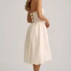 Vestido midi-longo convertible con detalle de lazo y bajo abullonado Gloriana en color marfil