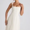 Vestido midi plisado de corte A con lazo Isadora en color marfil