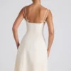 Vestido midi plisado de corte A con lazo Isadora en color marfil
