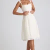 Vestido midi plisado de corte A con lazo Isadora en color marfil