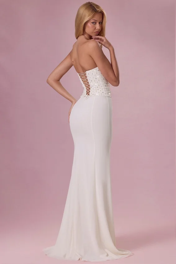Vestido sin tirantes con corsé adornado Melora en color marfil