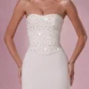 Vestido sin tirantes con corsé adornado Melora en color marfil