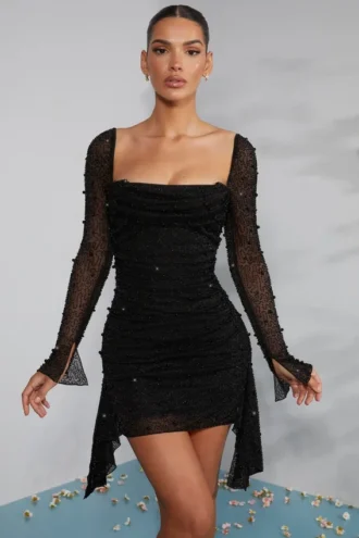 Vestido Tivoli de manga larga con cuello vuelto y adornos en negro